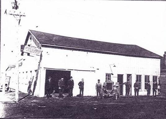 black and white photo of old shop